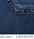 Seamless Denim fabric with yellow thread seams, denim jacket, denim pants, for background or fabric sample sale. 136545299