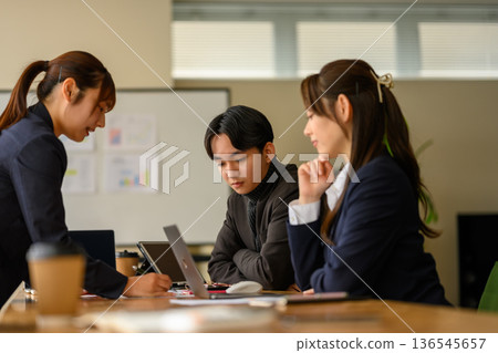 Young people concentrating in a meeting 136545657