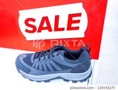 New stylish sneakers. Sporting footwear. Sale of modern sneakers New stylish sneakers. Sporting footwear. Sale of modern sneakers 136548275