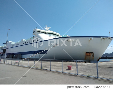 The large ferry "Bizan" moored at Tokushima Port. The port scenery on a clear day and the white hull. The large ferry "Bizan" moored at Tokushima Port. The port scenery on a clear day and the white hull. 136548445