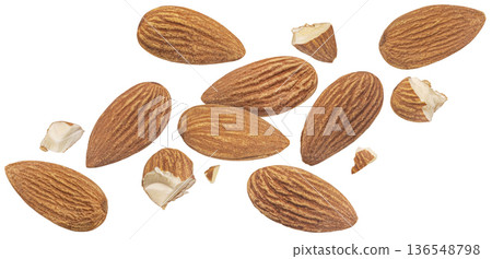 Falling almond nuts isolated on white background with clipping path, full depth of field 136548798