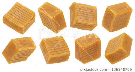 Caramel candy isolated, falling square toffee cubes on white background with clipping path, full depth of field Caramel candy isolated, falling square toffee cubes on white background with clipping path, full depth of field 136548799