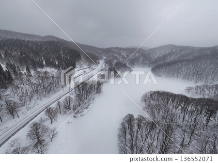 Aerial view of Nabekoshi Pass during heavy snowfall Aerial view of Nabekoshi Pass during heavy snowfall 136552071