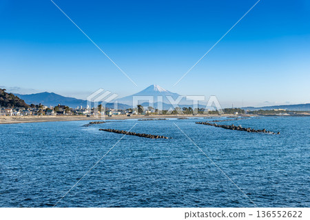 A spectacular view of Mount Fuji and Suruga Bay from Ishibe Coast in Shizuoka City, Shizuoka Prefecture A spectacular view of Mount Fuji and Suruga Bay from Ishibe Coast in Shizuoka City, Shizuoka Prefecture 136552622