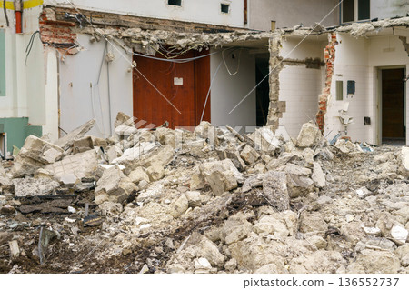 Construction site inside a building with broken walls, debris and exposed structure, renovation process, urban redevelopment, reconstruction concept Construction site inside a building with broken walls, debris and exposed structure, renovation process, urban redevelopment, reconstruction concept 136552737