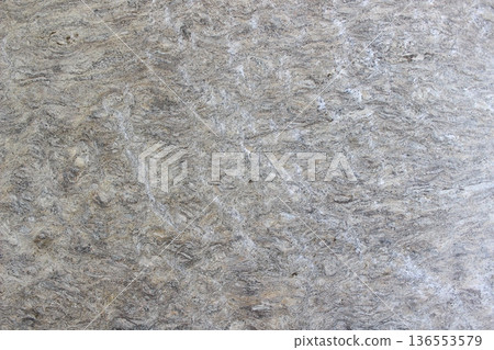 Grey granite stone texture with fine and dense natural mineral spots for outdoor area use. 136553579