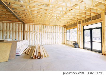 Construction site with wooden frames and materials in building under development Construction site with wooden frames and materials in building under development 136553793