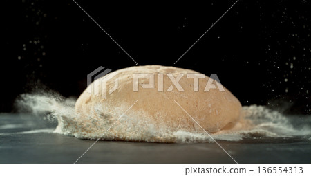 Dough Ball Dropping into Flour. Flour Explosion Effect During Baking Preparation on Wooden TableDough Ball Dropping into Flour. Flour Explosion Effect During Baking Preparation on Wooden Table Dough Ball Dropping into Flour. Flour Explosion Effect During Baking Preparation on Wooden TableDough Ball Dropping into Flour. Flour Explosion Effect During Baking Preparation on Wooden Table 136554313