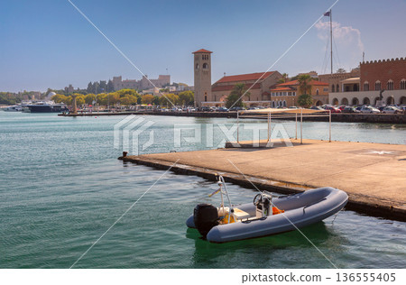 Mandraki Harbor with Historic Buildings in Rhodes, Greece 136555405