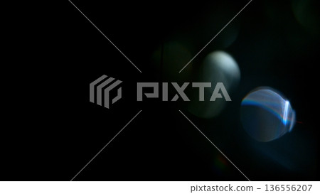 Real Lens Flare Reflections for Overlay or Transition Isolated on Black Background Real Lens Flare Reflections for Overlay or Transition Isolated on Black Background 136556207
