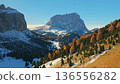 Panorama of the Dolomites mountains during autumn sunrise. Beautiful mountians of Alpi Dolomiti in Italy, South Tirol 136556282