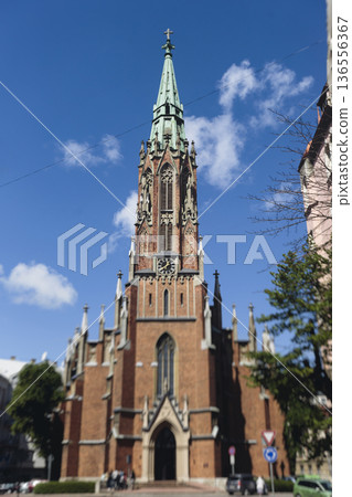 Riga Old Town view, Latvia, streets of Vecriga historical center with Town Hall square, House Of The Black Heads, Cathedral and church, travel to Latvia and Baltic States, summer day with a blue sky Riga Old Town view, Latvia, streets of Vecriga historical center with Town Hall square, House Of The Black Heads, Cathedral and church, travel to Latvia and Baltic States, summer day with a blue sky 136556367