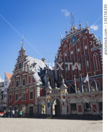 Riga Old Town view, Latvia, streets of  Vecriga historical center with Town Hall square, House Of The Black Heads, Cathedral and church, travel to Latvia and Baltic States, summer day with a blue sky 136556380