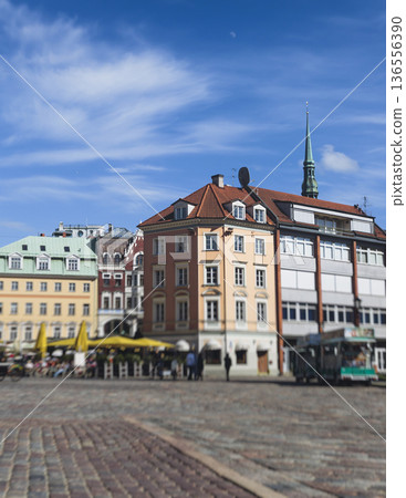 Riga Old Town view, Latvia, streets of  Vecriga historical center with Town Hall square, House Of The Black Heads, Cathedral and church, travel to Latvia and Baltic States, summer day with a blue sky 136556390