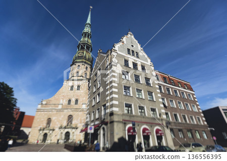 Riga Old Town view, Latvia, streets of Vecriga historical center with Town Hall square, House Of The Black Heads, Cathedral and church, travel to Latvia and Baltic States, summer day with a blue sky Riga Old Town view, Latvia, streets of Vecriga historical center with Town Hall square, House Of The Black Heads, Cathedral and church, travel to Latvia and Baltic States, summer day with a blue sky 136556395