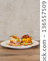 Eggs benedict variations, breakfast and brunch gourmet food plating 136557509