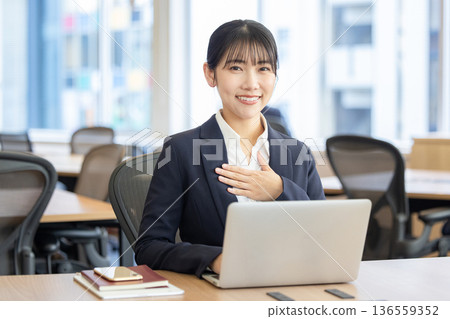 Woman working in the office 136559352