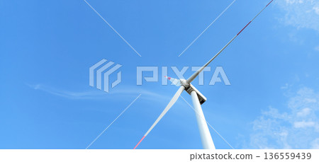 Side View of Windmill or Wind turbine generator for eco energy in power plant 136559439