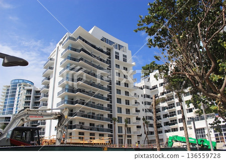 Miami beach and cityscape, tropical resort scenery, beautiful beaches and Art Deco architecture, Latin American vibes Miami beach and cityscape, tropical resort scenery, beautiful beaches and Art Deco architecture, Latin American vibes 136559728