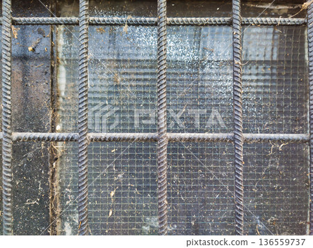 Budapest Industrial Security Grate at Pongratz Gergely ter with Twisted Iron Bars and Reinforced Wire Mesh Glass Architectural Detail Background for Urban Safety and Design Hungary Art Budapest Industrial Security Grate at Pongratz Gergely ter with Twisted Iron Bars and Reinforced Wire Mesh Glass Architectural Detail Background for Urban Safety and Design Hungary Art 136559737