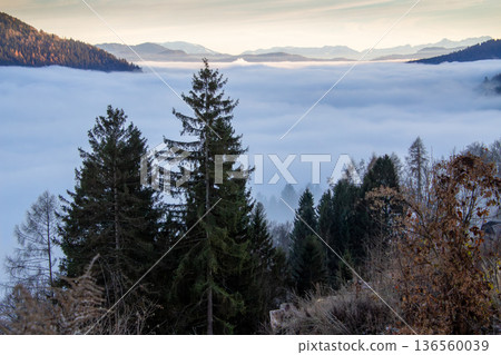 Landscape with sunset above the mountain tops in Austria Landscape with sunset above the mountain tops in Austria 136560039