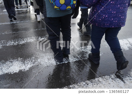A road crowded with tourists (close-up of feet) A road crowded with tourists (close-up of feet) 136560127