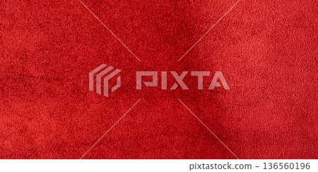 Warm red suede macro photo as a background. 136560196