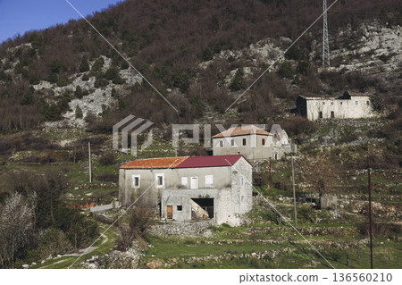 Skadar Lake National park panoramic landscape, Montenegro, Hiking in Skadar Lake, Skadarsko jezero, also called Shkodra or Scutari, with mountains and village in a sunny day, Montenegrin Balkan nature 136560210