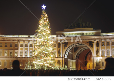 Christmas tree on Palace square, Saint-Petersburg, New Year and Christmas in Russia, glowing decor decoration in a winter snowy street, with night decor illumination, city outdoor lights and garlands Christmas tree on Palace square, Saint-Petersburg, New Year and Christmas in Russia, glowing decor decoration in a winter snowy street, with night decor illumination, city outdoor lights and garlands 136560229