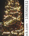 Christmas tree on Palace square, Saint-Petersburg, New Year and Christmas in Russia, glowing decor decoration in a winter snowy street, with night decor illumination, city outdoor lights and garlands 136560232