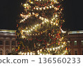 Christmas tree on Palace square, Saint-Petersburg, New Year and Christmas in Russia, glowing decor decoration in a winter snowy street, with night decor illumination, city outdoor lights and garlands 136560233