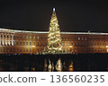 Christmas tree on Palace square, Saint-Petersburg, New Year and Christmas in Russia, glowing decor decoration in a winter snowy street, with night decor illumination, city outdoor lights and garlands 136560235