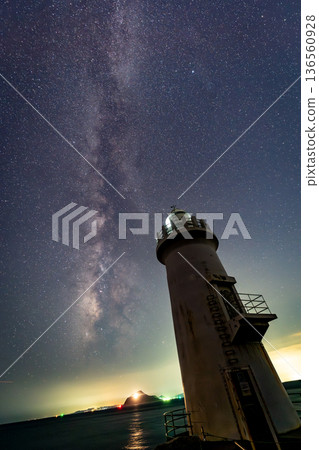 A fantastic night view of the starry sky and lighthouse A fantastic night view of the starry sky and lighthouse 136560928