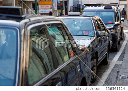 Japanese taxis (empty) waiting for customers in the downtown area 136561124