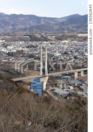 A panoramic view of Chichibu Park Bridge and the city from the observation deck at Chichibu Muse Park in winter A panoramic view of Chichibu Park Bridge and the city from the observation deck at Chichibu Muse Park in winter 136562645