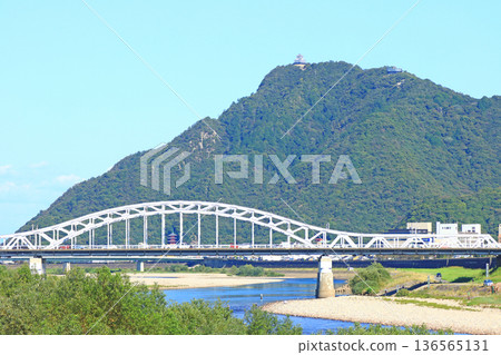 Gifu City, Gifu Prefecture, scenery of Chuseki Bridge and Mount Kinka Gifu City, Gifu Prefecture, scenery of Chuseki Bridge and Mount Kinka 136565131