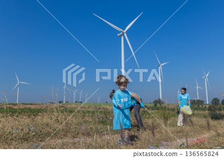 Family collecting garbage at park Family collecting garbage at park 136565824
