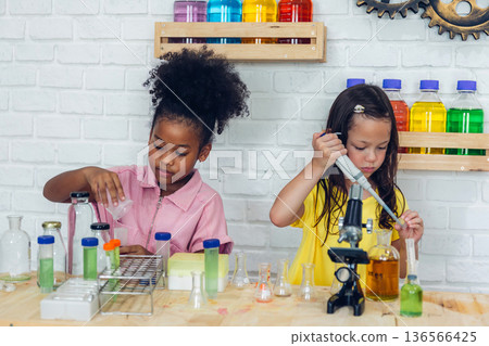 Girl is study in the Classroom.  136566425