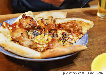 Homemade teriyaki pizza on the dining table Homemade teriyaki pizza on the dining table 136567287