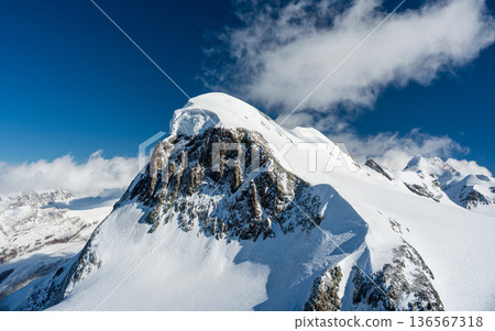 Close-up of the Breithorn peak covered with snow and glaciers in winter, Zermatt, Valais, Switzerland 136567318