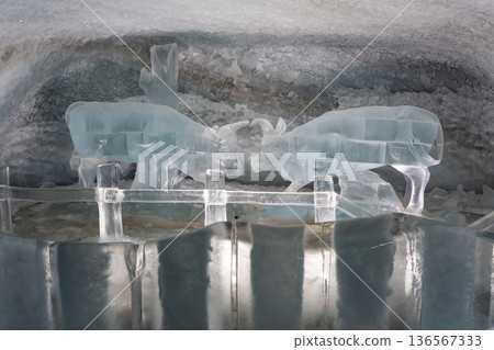 Ice tunnel and ice sculptures at the Matterhorn Glacier Paradise Ice Palace. Zermatt, Valais, Switzerland Ice tunnel and ice sculptures at the Matterhorn Glacier Paradise Ice Palace. Zermatt, Valais, Switzerland 136567333