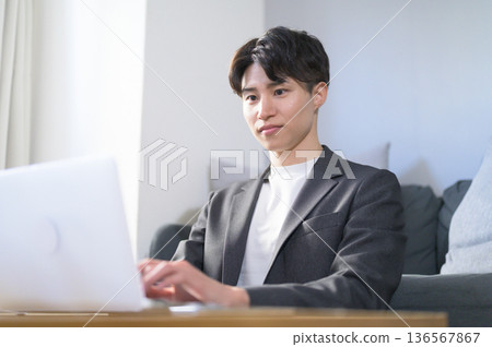Man doing remote work 136567867