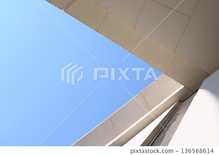 A modern curved arch architecture and a composition with space in the blue sky A modern curved arch architecture and a composition with space in the blue sky 136568614
