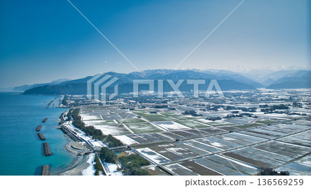 A slight snow melt on the Kurobe River alluvial fan and coastline in Toyama Prefecture, Japan A slight snow melt on the Kurobe River alluvial fan and coastline in Toyama Prefecture, Japan 136569259