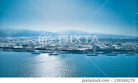 A slight snow melt on the Kurobe River alluvial fan and coastline in Toyama Prefecture, Japan 136569279