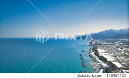 A slight snow melt on the Kurobe River alluvial fan and coastline in Toyama Prefecture, Japan A slight snow melt on the Kurobe River alluvial fan and coastline in Toyama Prefecture, Japan 136569283