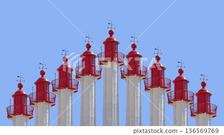 Collage of sea lighthouses on a blue background Collage of sea lighthouses on a blue background 136569769