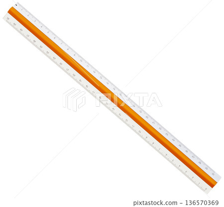 A 30cm plastic ruler with an orange cut-out line on a white background 136570369