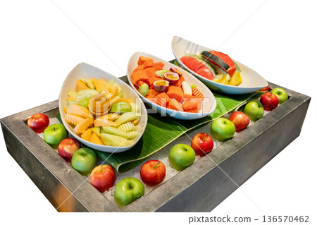 Top view of mixed fruit cut into pieces in the bowl, focus selective 136570462