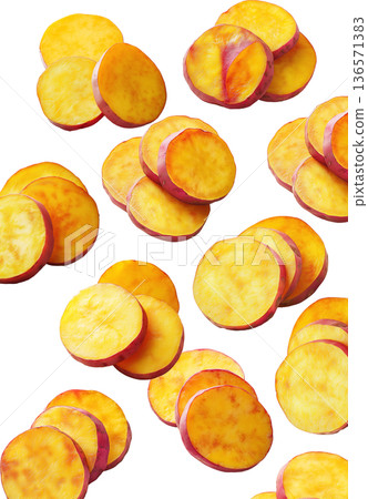 Piles of sweet potato slices placed randomly, isolated on white background, concept of healthy snack food 136571383